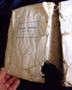Inside front cover before repair.