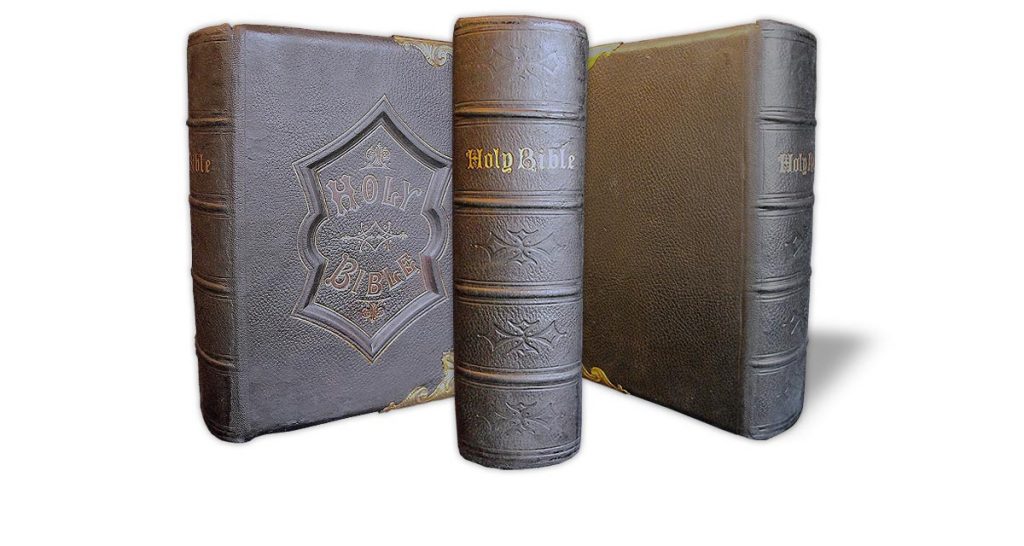 The same Bible once rebacked and re-coloured, with the original spine re-used