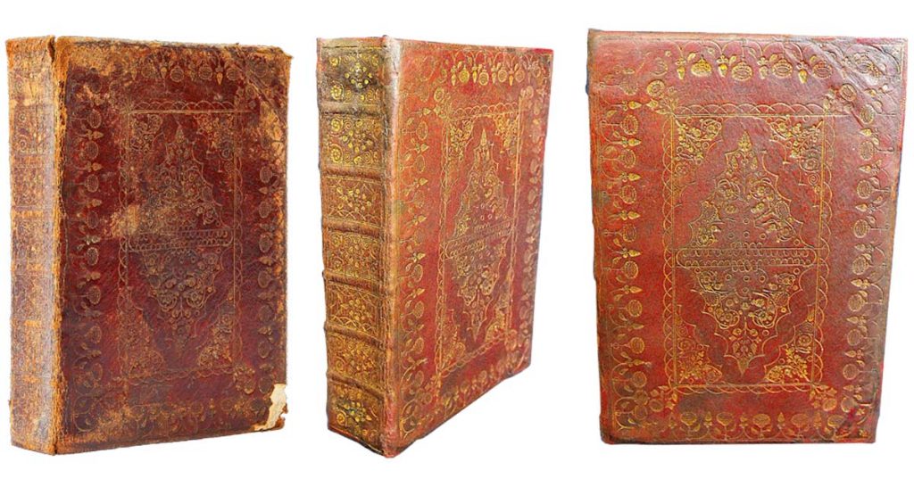 A beautifully bound 17th century Bible that was in need of restoration (left). The same Bible after restoration (centre & right). Bible restoration