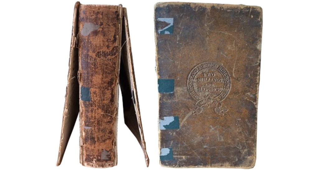 A small Victorian family Bible that arrived with the spine worn away and the covers detached.