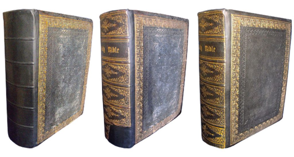 This Bible had part of its spine missing. The Bible was rebacked, the remains of the spine were mounted and the missing gold decoration was re-tooled.